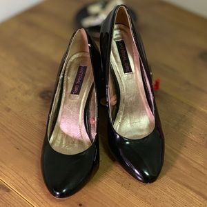 Material Girl patent leather pumps